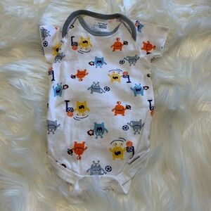 Size 3-6 mos sports onesie C1